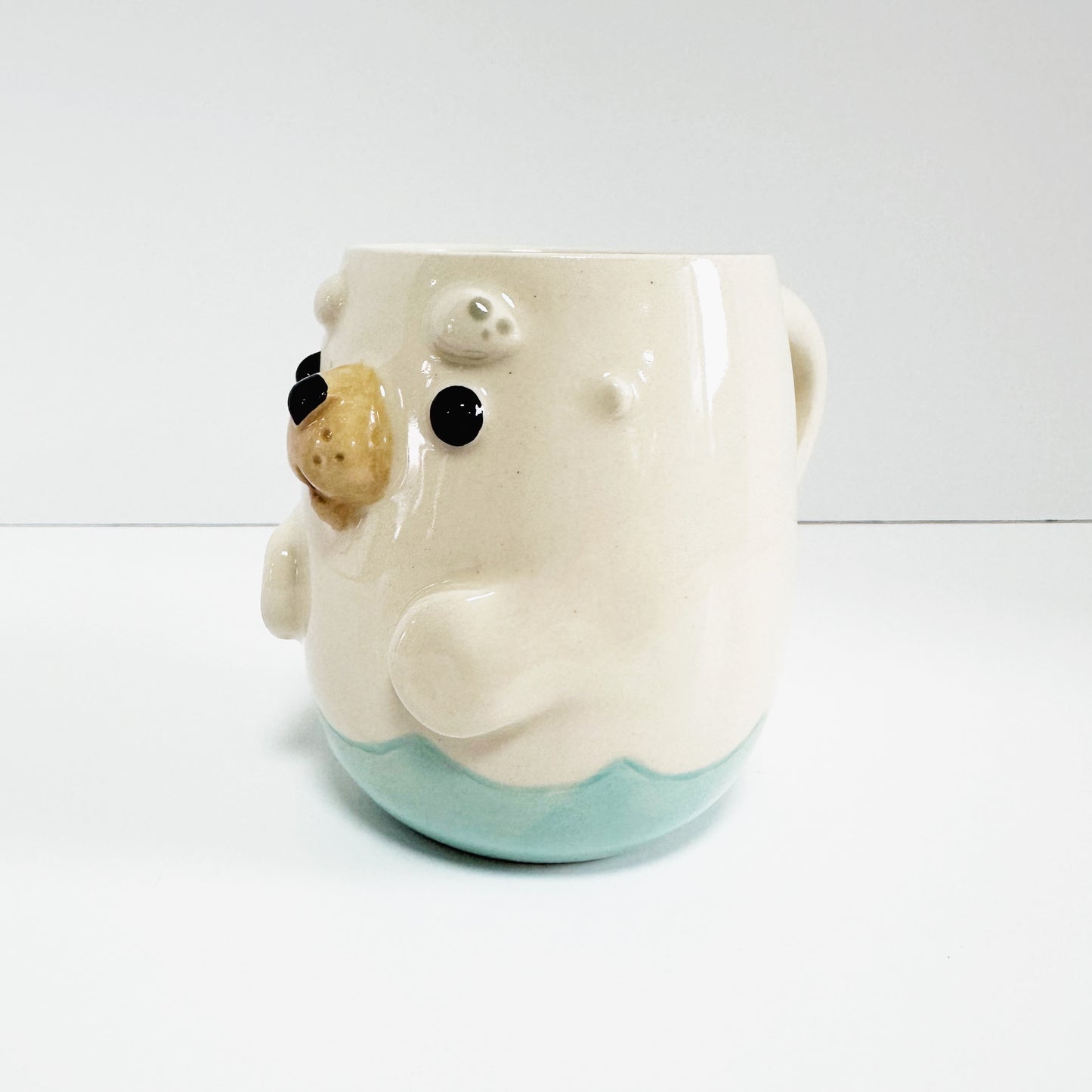 SECONDS Seal Mug, bottom flaw