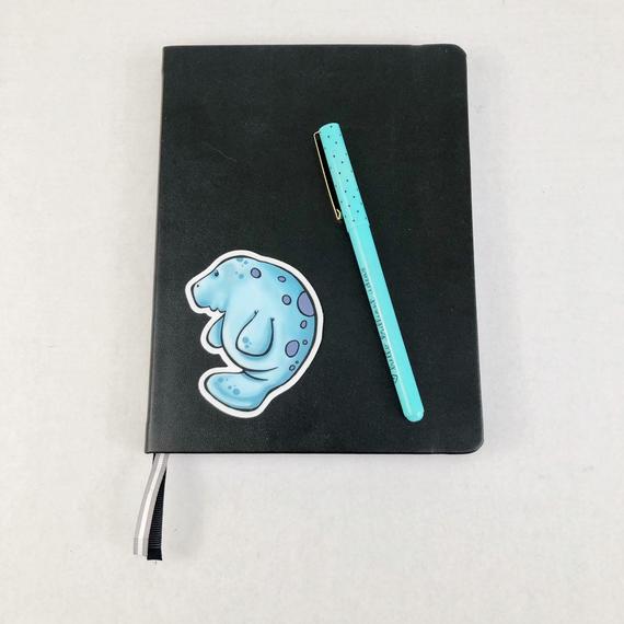 Manatee Die Cut Sticker on Notebook from Salty Sea Dog